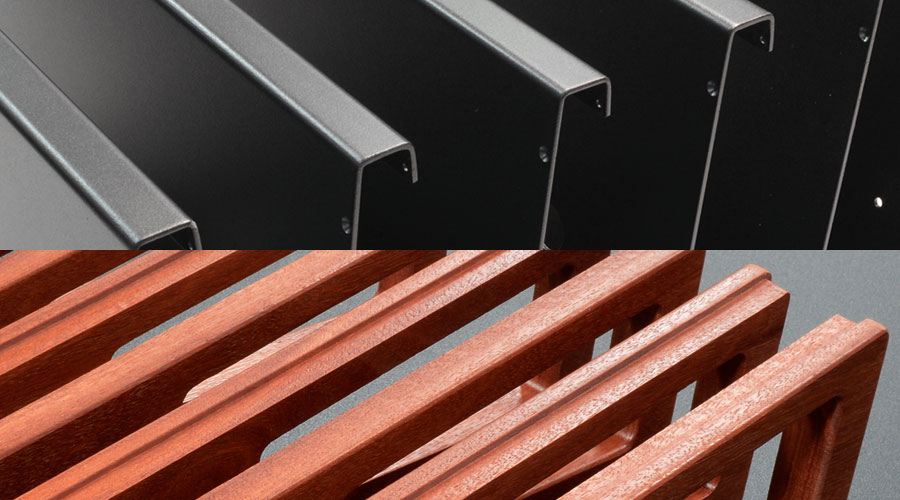 Powder coating is applied to the metal and nitro lacquer applied to the timber.